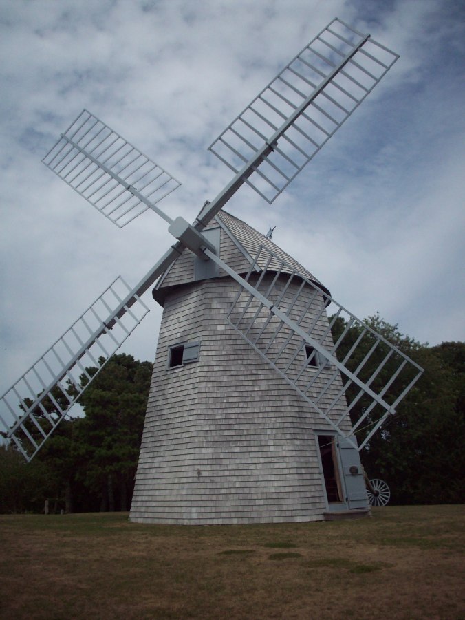 An angled front view of Godfrey Windmill in Chatham, MA